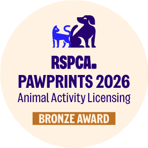 RSPCA PawPrints 2026 bronze award badge for animal activity licensing